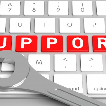 mackeeper mac utilities review wrench on white laptop keyboard support written with red keys